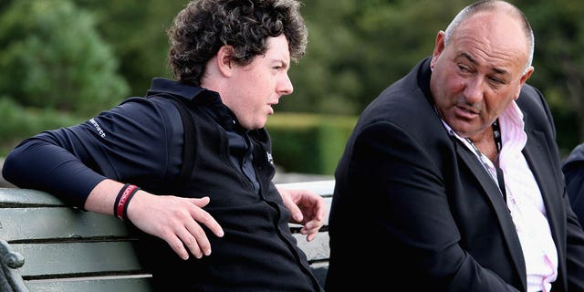 Rory McIlroy of Northern Ireland and his manager Andrew "Chubby" Chandler talk during the pro-am event prior to The Johnnie Walker Championship at Gleneagles Aug. 27, 2008, at the Gleneagles Hotel and Resort.