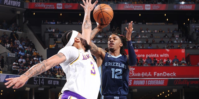 Ja Morant #12 of the Memphis Grizzlies shoots the ball during Round 1 Game 1 of the NBA Playoffs against the Los Angeles Lakers on April 16, 2023 at FedExForum in Memphis, Tennessee.