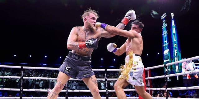 Tommy Fury exchanges punches with Jake Paul during a cruiserweight title fight at Diriyah Arena Feb. 26, 2023, in Riyadh, Saudi Arabia.