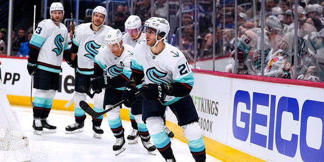 Seattle Kraken center Alex Wennberg (21) celebrates a goal against the Colorado Avalanche during the second period of Game 1 of a first-round NHL hockey playoff series Tuesday, April 18, 2023, in Denver. 