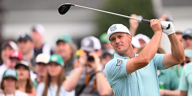 Bryson DeChambeau of the United States plays his shot from the first tee during a practice round prior to the 2023 Masters Tournament at Augusta National Golf Club on April 03, 2023 in Augusta, Georgia. 