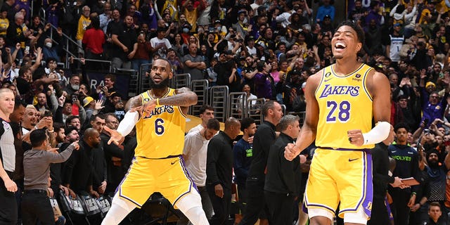 LeBron James #6 of the Los Angeles Lakers and Rui Hachimura #28 celebrate during the 2023 Play-In Tournament on April 11, 2023 at Crypto.Com Arena in Los Angeles, California. 