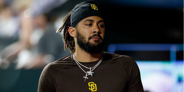 San Diego Padres shortstop Fernando Tatis Jr. (23) walks in the dugout during a regular season game between the San Diego Padres and Colorado Rockies on June 18, 2022, at Coors Field in Denver, CO. 