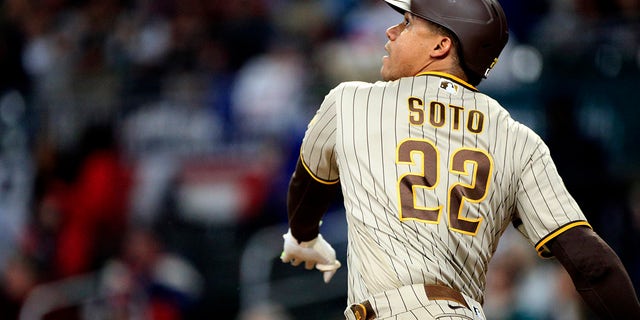 San Diego Padres left fielder Juan Soto swings against the Braves on April 8, 2023, at Truist Park in Atlanta.