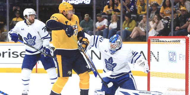 Nashville Predators center Matt Duchene (95) reacts to the deflected puck during the NHL game between the Nashville Predators and Toronto Maple Leafs, held on March 26, 2023, at Bridgestone Arena in Nashville, Tennessee.