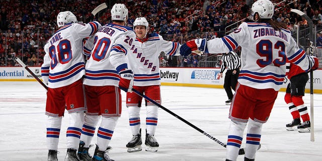 Adam Fox #23 of the New York Rangers celebrates a first period powerplay goal by Chris Kreider #20 against the New Jersey Devils during Game One in the First Round of the 2023 Stanley Cup Playoffs at the Prudential Center on April 18, 2023 in Newark, New Jersey. 