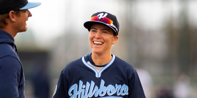 Ronnie Gajownik (34) of the Hillsboro Hops jokes with players before a game at Gesa Stadium Thursday, April 6, 2023, in Paseco, Wash.