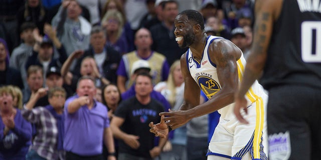 Golden State Warriors forward Draymond Green (23) reacts to being called for a foul for stepping on Sacramento Kings forward Domantas Sabonis during the second half of Game 2 in the first round of the NBA basketball playoffs in Sacramento, Calif., Monday, April 17, 2023.