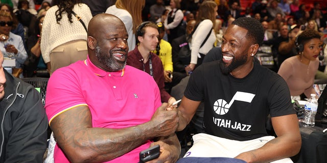 Shaquille O'Neal talks with Dwyane Wade during Ruffles NBA All-Star Celebrity Game as part of 2023 NBA All Star Weekend on Friday, February 17, 2023, at the Jon M. Huntsman Center in Salt Lake City, Utah.