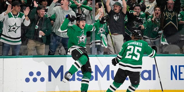 Roope Hintz celebrates scoring a goal agains the Wild