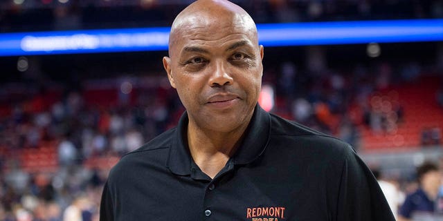 Former player Charles Barkley cheers on the Auburn Tigers at Neville Arena in Auburn, Alabama., on March 4, 2023.