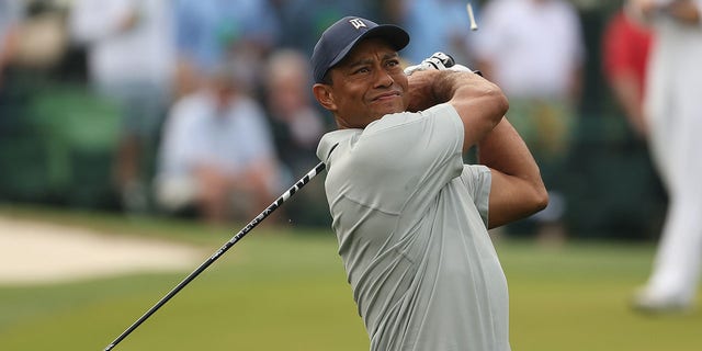 Tiger Woods of the United States plays his shot from the third tee during a practice round prior to the 2023 Masters Tournament at Augusta National Golf Club on April 04, 2023 in Augusta, Georgia.