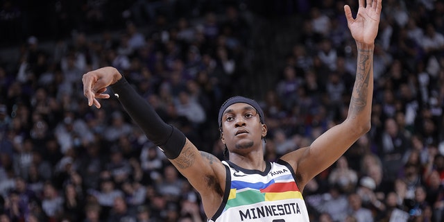 Jaden McDaniels #3 of the Minnesota Timberwolves holds his follow through during the game against the Sacramento Kings on March 27, 2023 at Golden 1 Center in Sacramento, California.