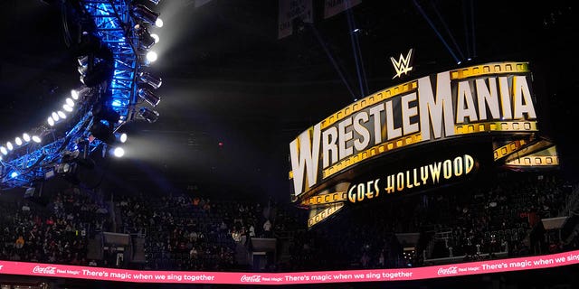 A WrestleMania sign hangs over the crowd during a WWE Monday Night RAW event in Boston on March 6, 2023.